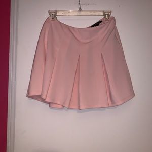 pink pleated skirt